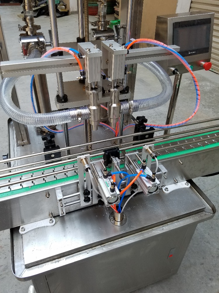 4 heads automatic liquid filling machine